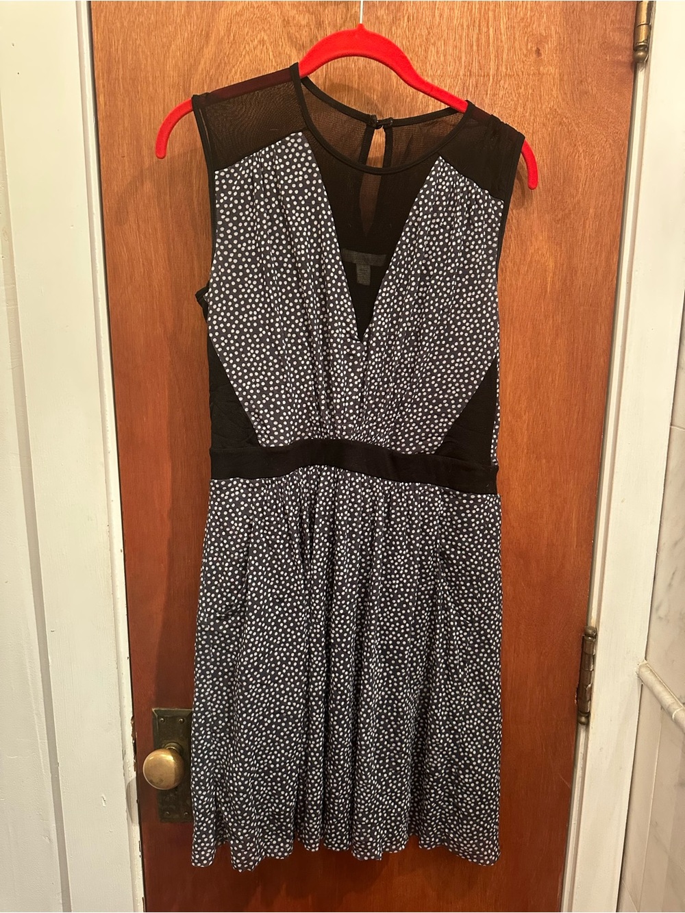 Weston Wear black polka dot dress with pockets.